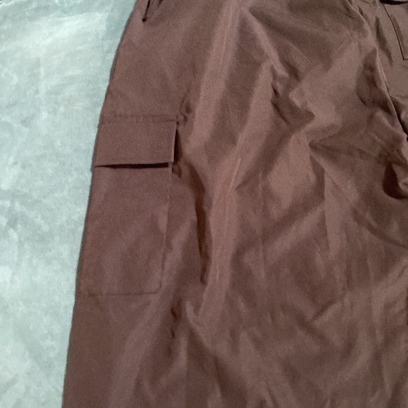 Black parachute pants no size but runs 2XL to 3XL adjustable waist. Never worn - Picture 7 of 9